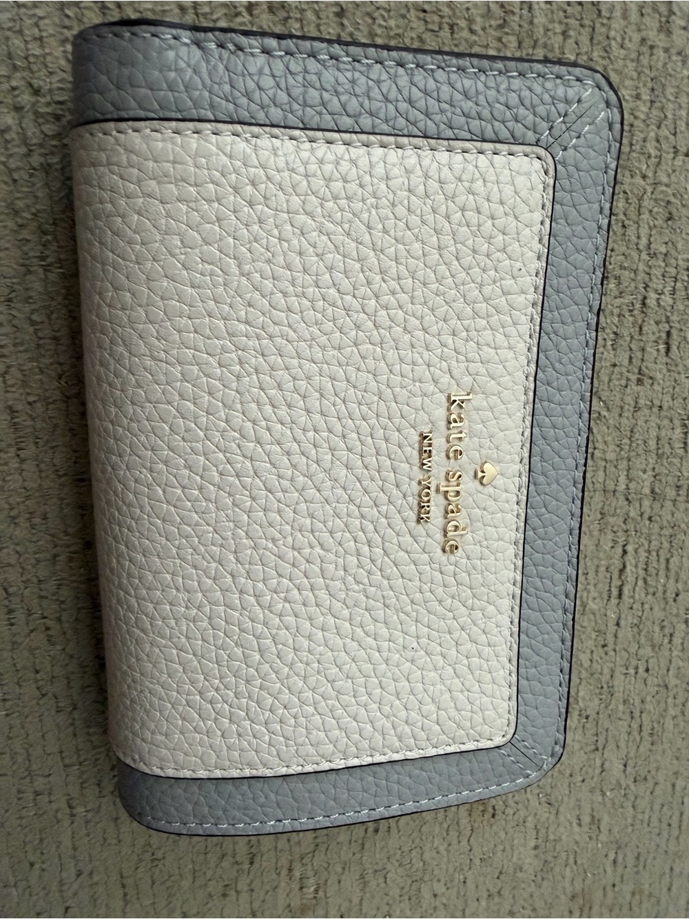 kate spade Cream Pebbled Leather Bifold Wallet